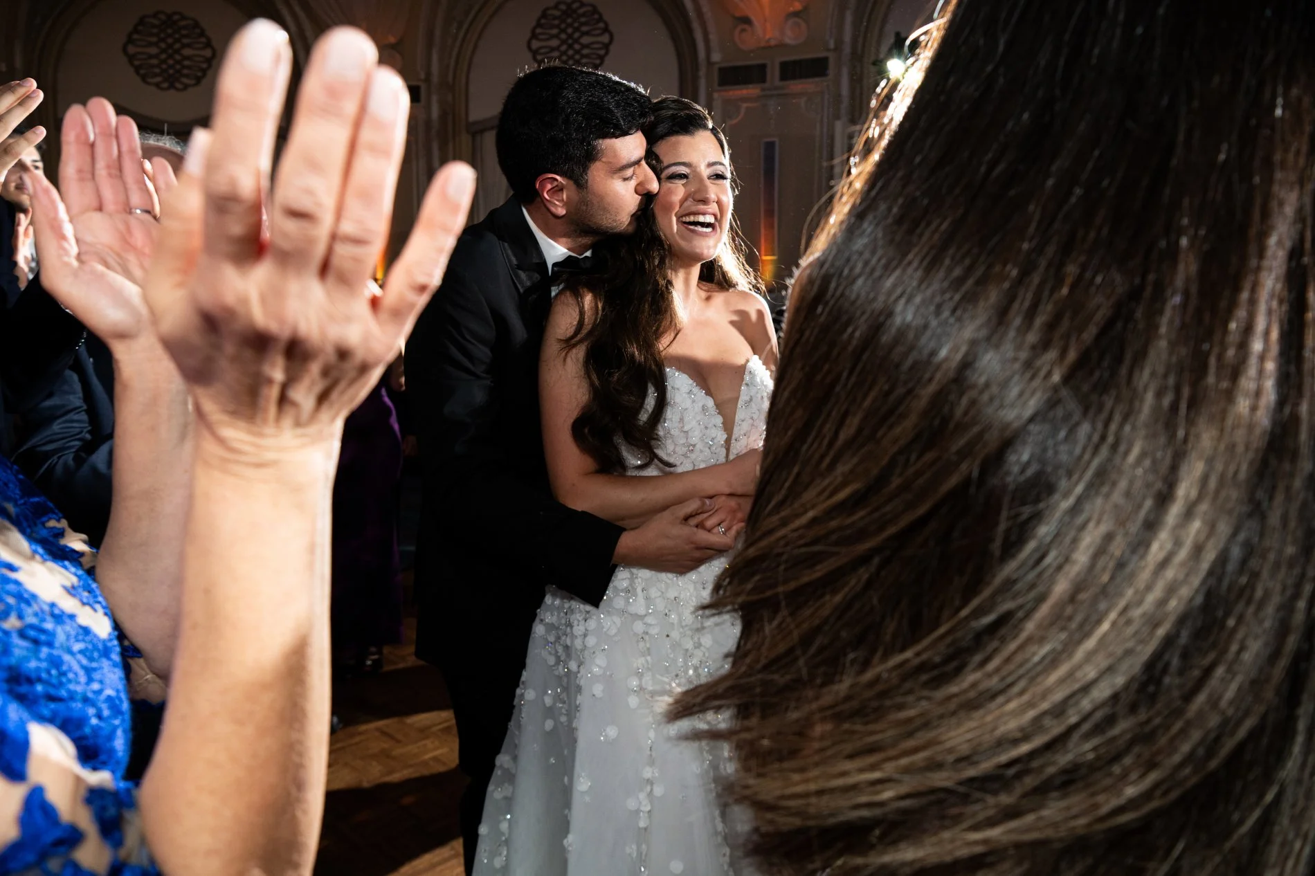 The newly married couple dances together during their Boston wedding photojournalism session at Fairmont Copley Plaza Hotel.