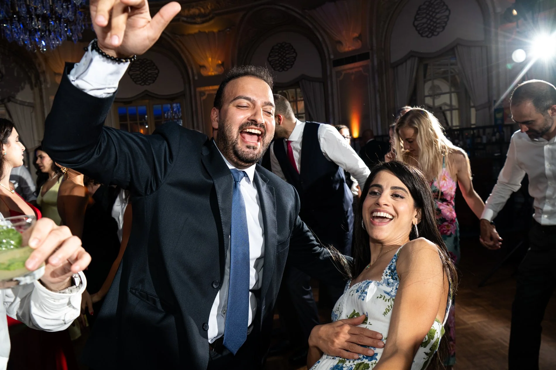 Guests dance during a Boston documentary style wedding session at Fairmont Copley Plaza Hotel.
