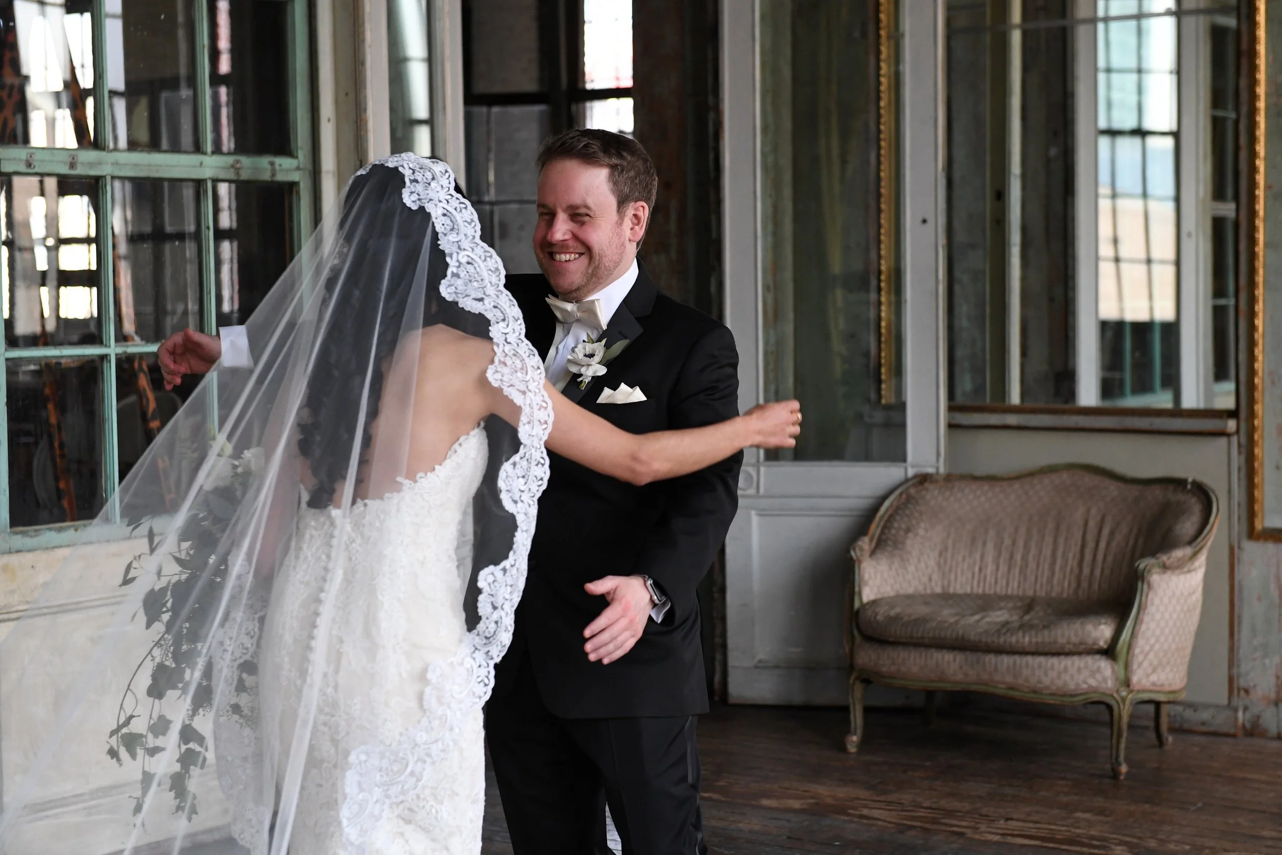 Andy & Micelys hug during their first look