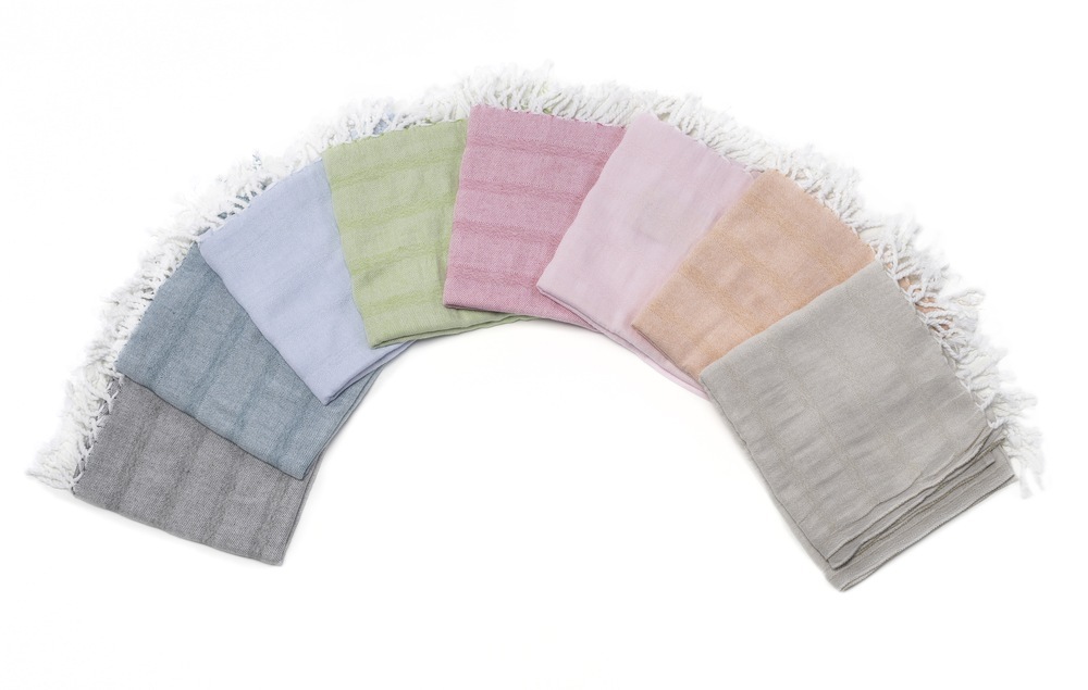 I love the colors of these Loomed NOLA Serendipity Scarves ($40) . They're handwoven from organic Turkish cotton. 