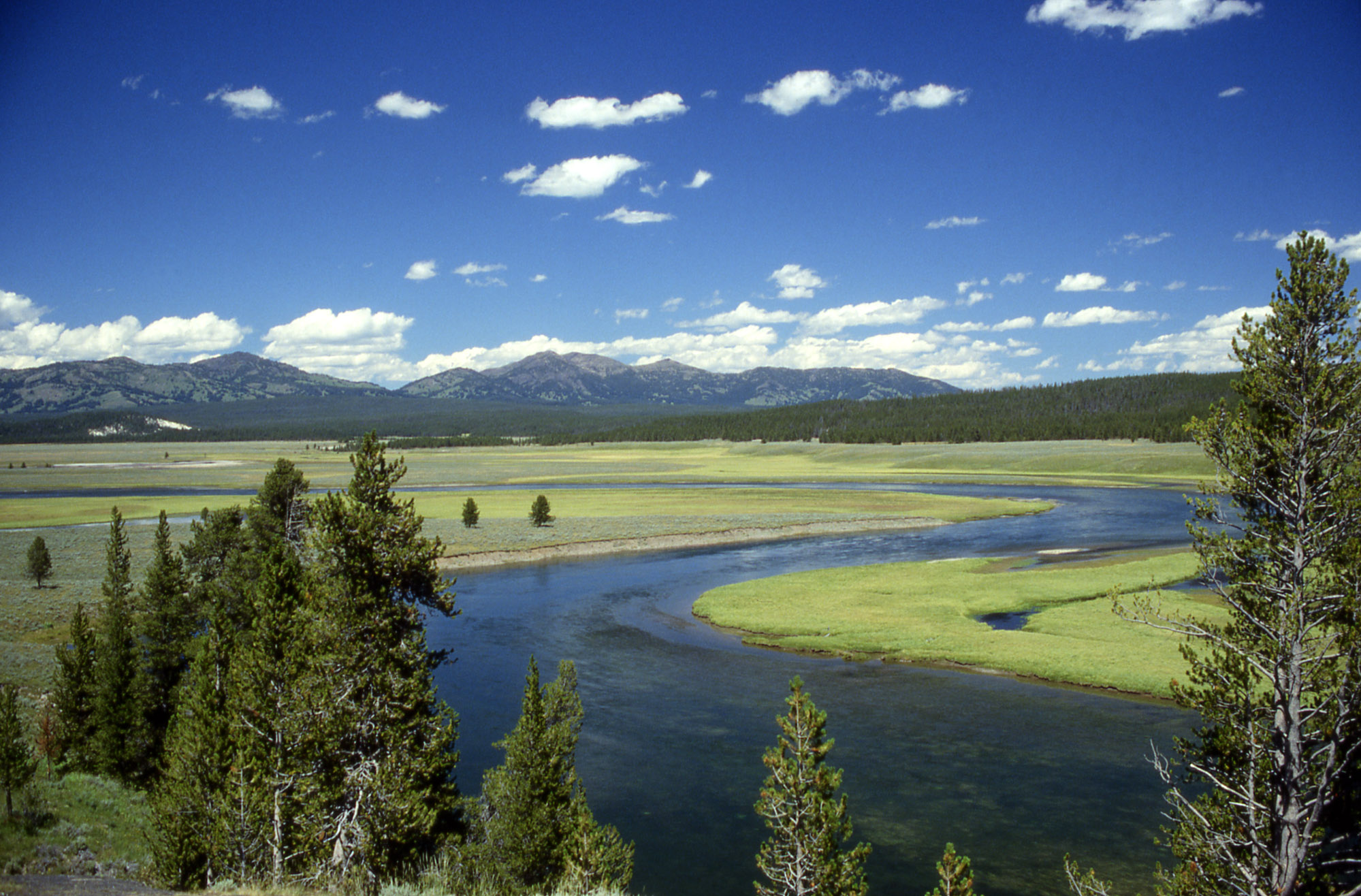 "Yellowstone River in Hayden Valley" by Ed Austin/Herb Jones - http://www.nps.gov/archive/yell/slidefile/water/creeksstreamsrivers/yellrdbelowlake/Images/13240.jpg. Licensed under Public Domain via Wikimedia Commons 
