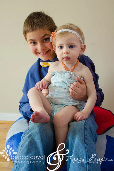 I'm OBSESSED with Kaelyn's romper. It's the " Elizabeth " romper (12 months - 6 years), and the fit is absolutely perfect! Merri Poppins used the fabric scraps to whip up the most perfect headband too. She's a crafty one!