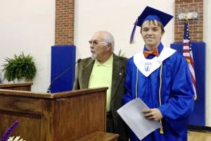 Sawyer L. Locke, from Northwest Whitfield High School, was awarded a scholarship by Georgia SWANA board member emeritus Mack Belue during Senior Recognition Day.