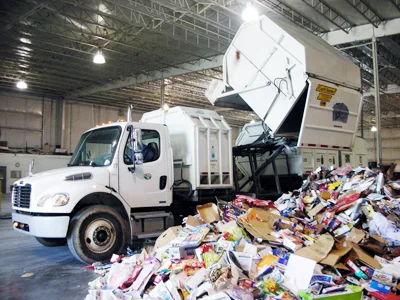 A load of mixed paper is dropped off at the Recycling Center by a City of Dalton Curbside Recycling truck. Mixed paper is recycled to make a variety of goods that range from restaurant napkins to paperboard boxes for pre-packaged food.