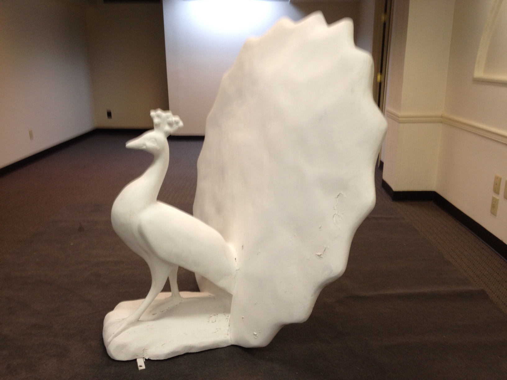 KDWB_peacock statue in workroom.jpg