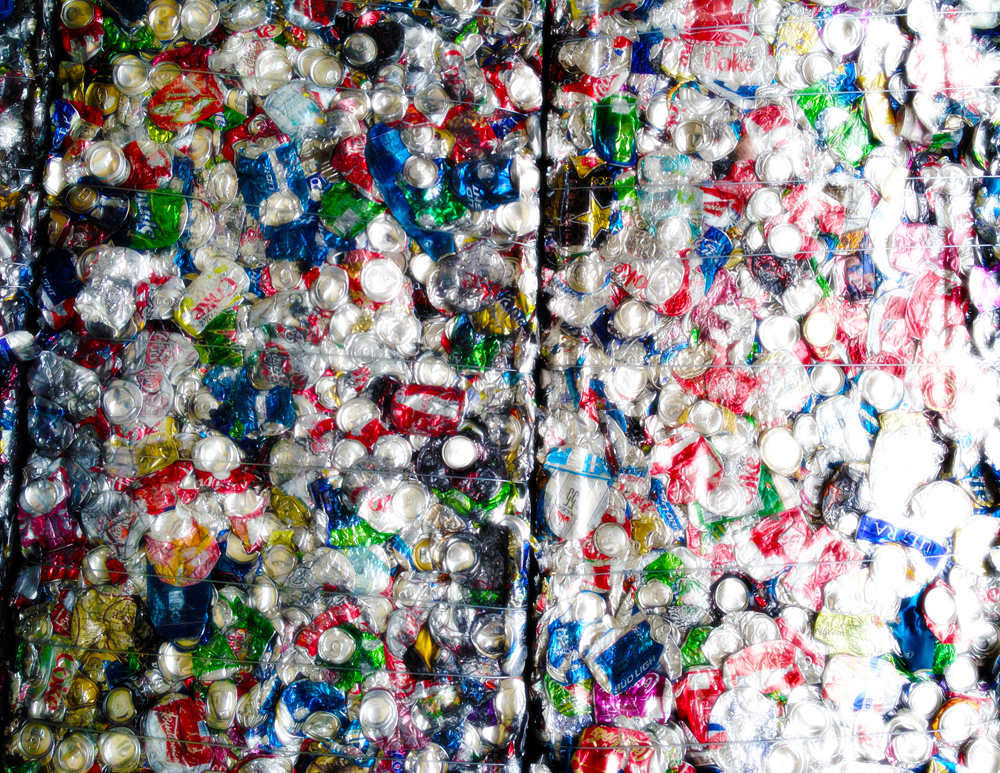 The recycling process for an aluminum beverage can takes as little as sixty days. Recycling one can saves the energy required to run a television set for three hours. Pictured is a bale of cans ready to be sent to a manufacture for processing. 