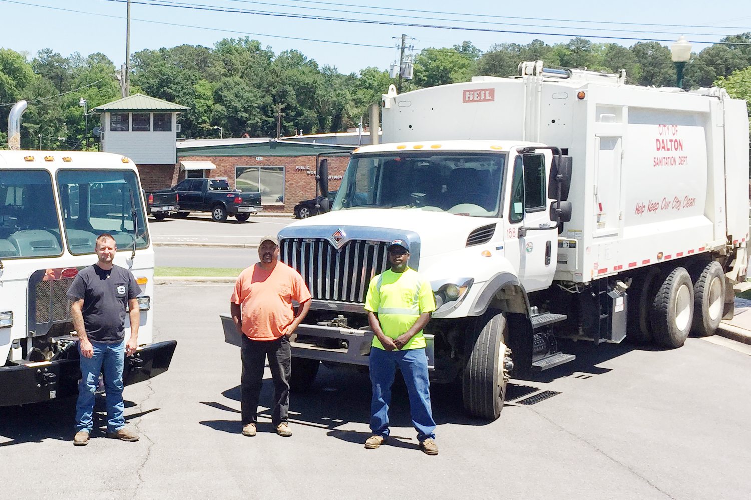 Pictured are City of Dalton garbage collectors from the public works department. From left: K.T. Toliver, Quinton Dupree, and Shane Stepp. (Not pictured is Shane Jordan.)