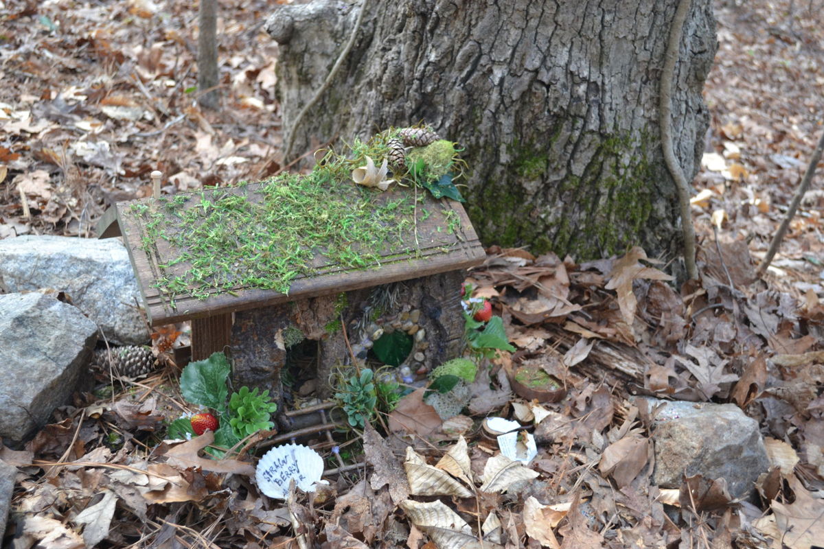 This little house for fairies, and nature’s friends, placed at the foot of a tree along a walking trail in the forest was made with natural materials. The strawberry themed cottage is located at the Chattahoochee Nature Center in Roswell, Georgia.