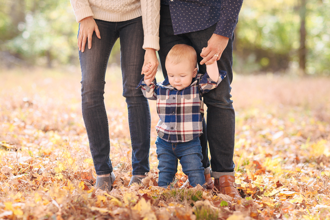 A gentle moment during an autumn family portrait session.