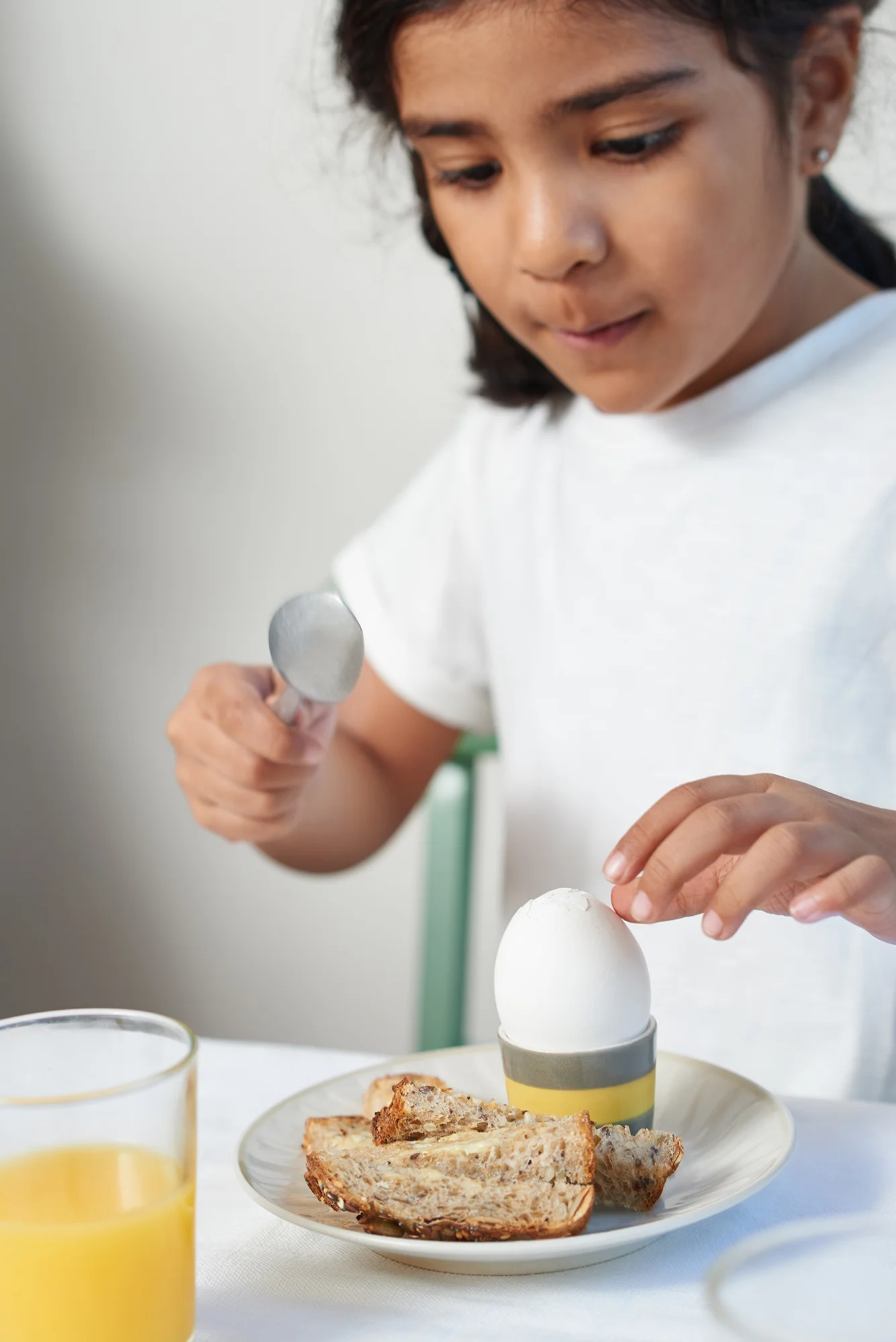 Young girl Eating Breakfast - Lifestyle Photography