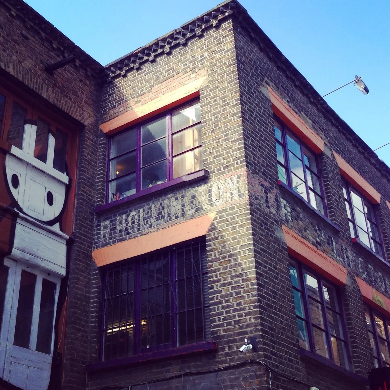 GHOST SIGN OF FURNITURE MANUFACTURER, r HOLLINGTON, STILL VISIBLE ABOVE THE COMEDY CLUB: http://urbantypo.tumblr.com/