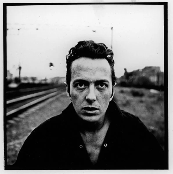 Joe Strummer of the clash, photographed in Shoreditch, 1988, by Peter Anderson.