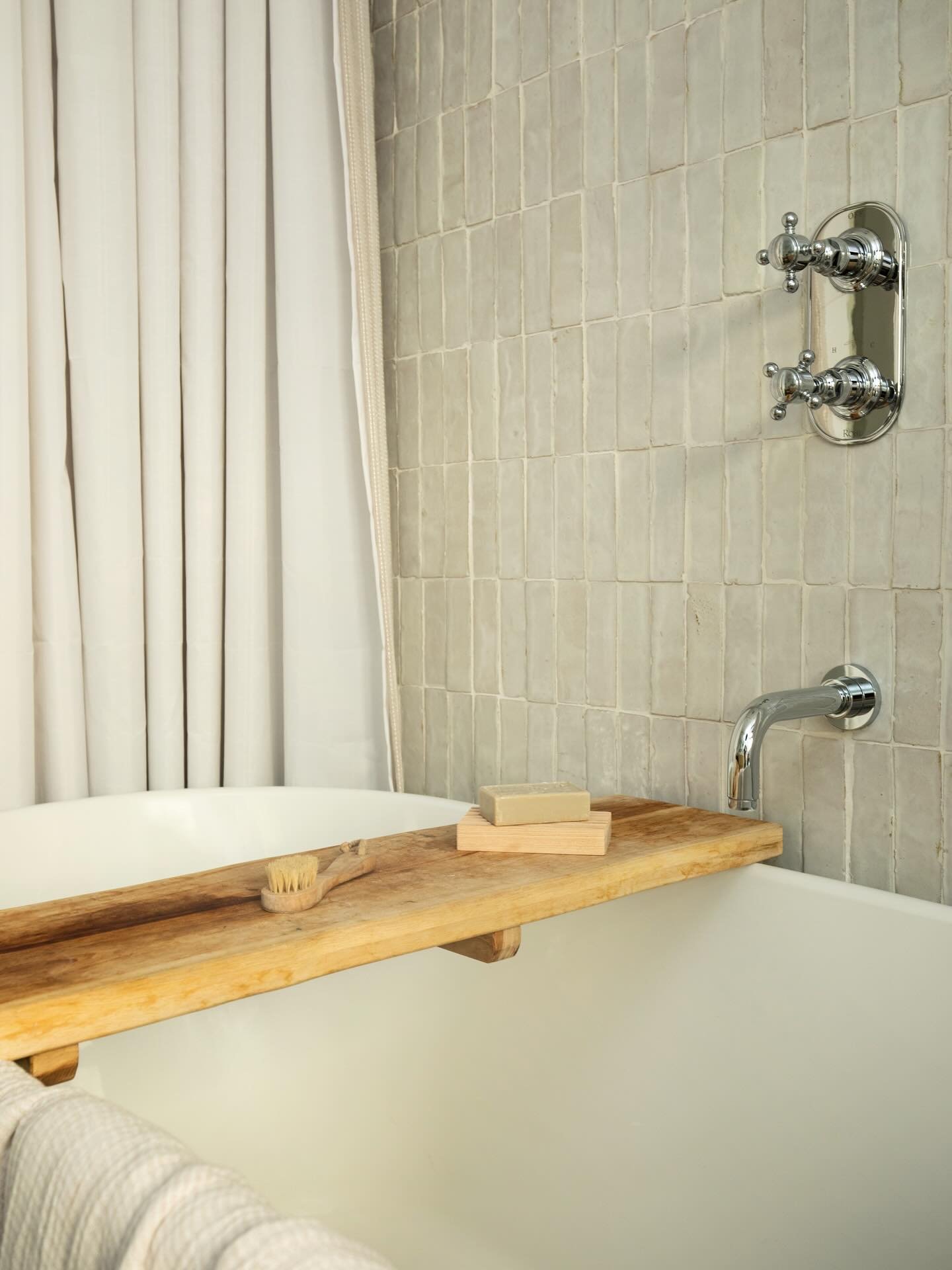 For every project, we take incredible care to understand exactly how the clients live and how they want to use the beautiful things we procure for them. For a custom bathroom, we go as far as to look at tub sizing the slope of the back, the materials