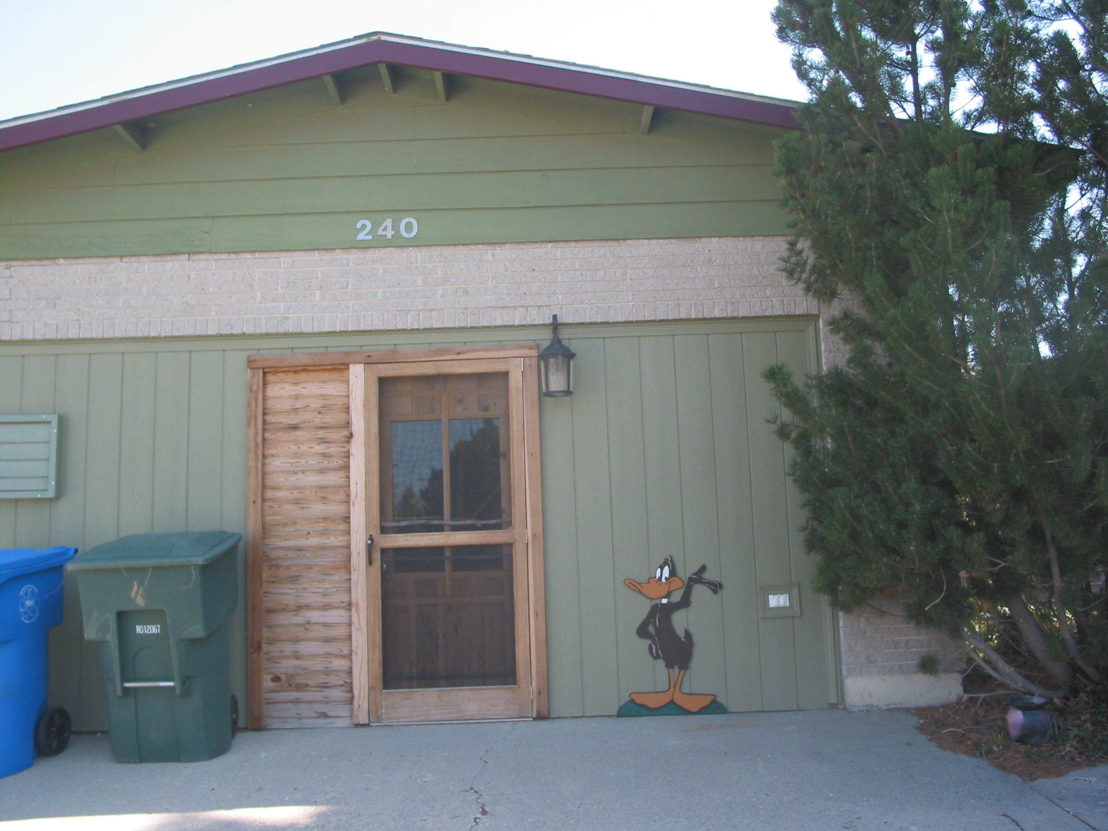 Here is the front door to my studio. You can see a cut out of Daffy Duck my sister Debbie painted for me. You will see more of Daffy inside.
