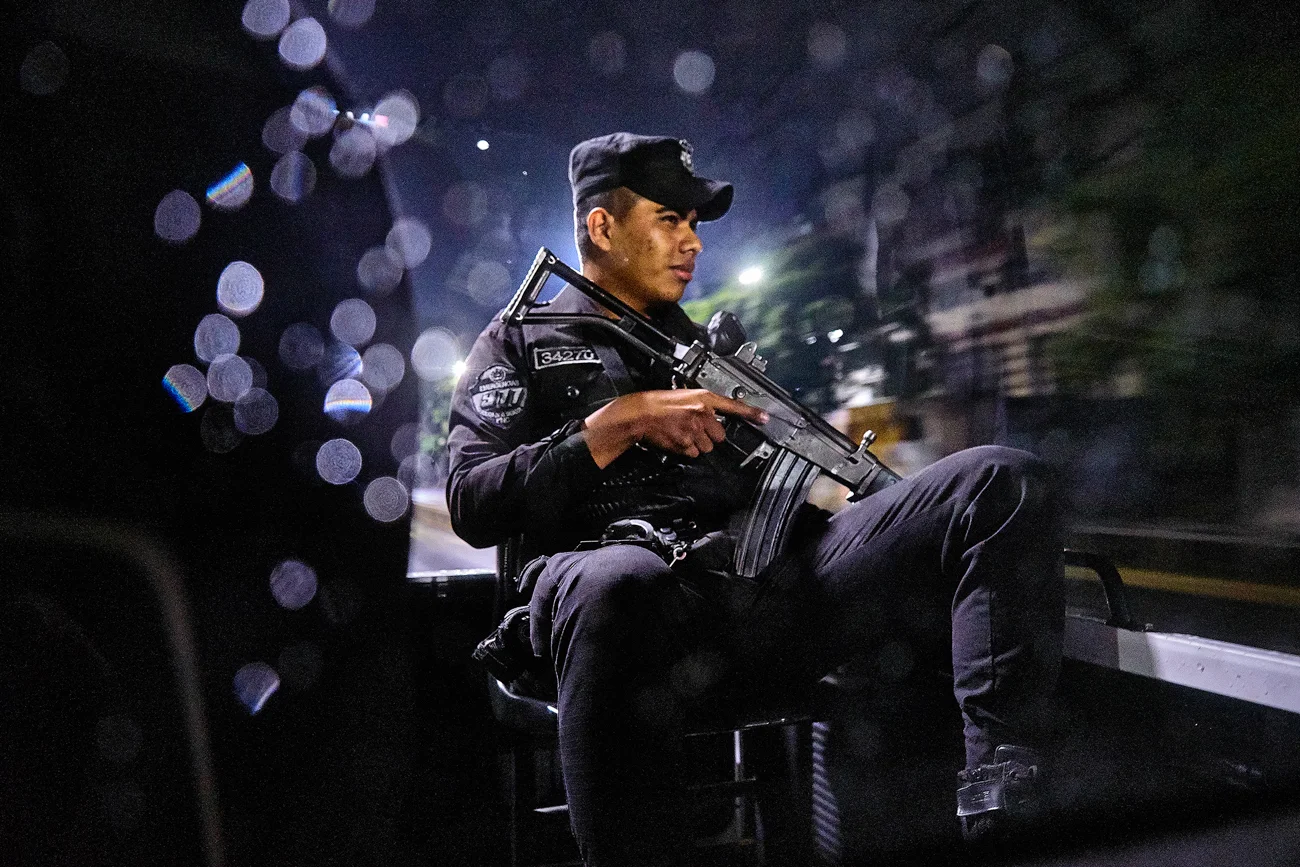  Armed police patrol MS-13 controlled neighbourhood in Central San Salvador; In 2016 alone, 5,257 intentional homicides were committed in El Salvador (83 murders per 100,000 population.) 