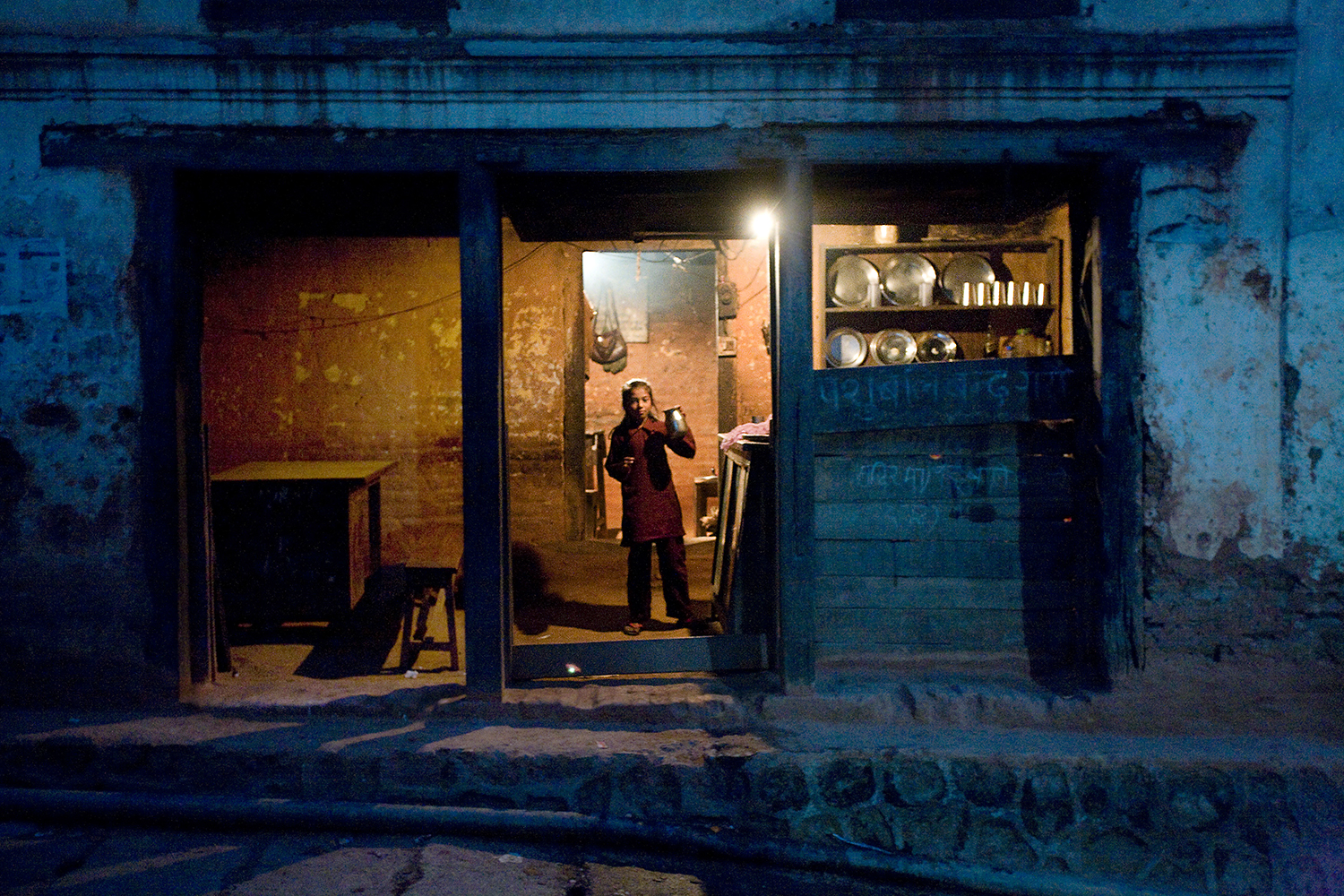 Young girl in teahouse. Tansen, Palpa, Nepal. 2010.