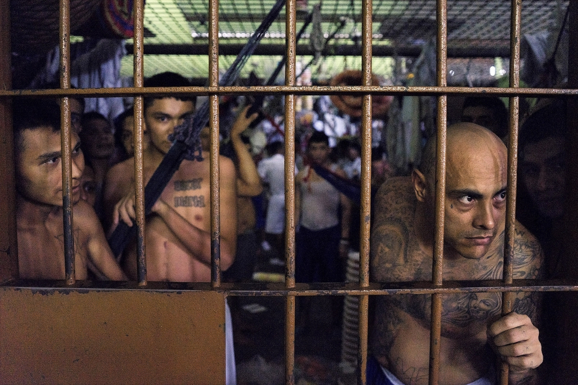 MS-13 gang members newly arrived at Apanteos prison are kept in a cramped holding cell separate from the main population. Approximately 75 prisoners have been held in this one cell for up to 90 days with only 5 minutes per day outside to either show