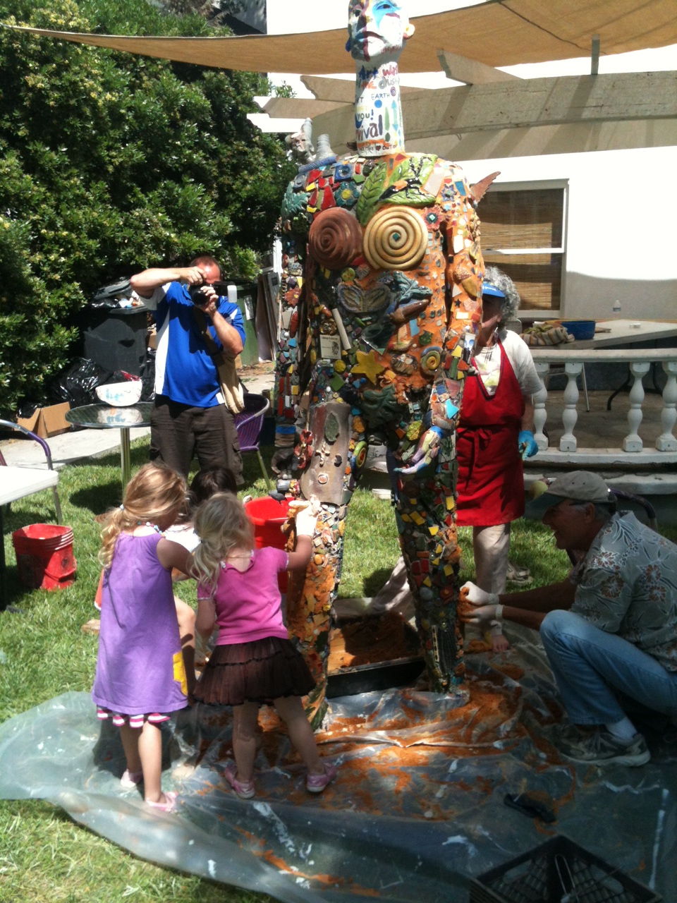  Members of the Davis community and visiting college ceramic students participating on weekend of CACCA 2012. Front lawn of the John Natsoulas Gallery 521 First Street. 