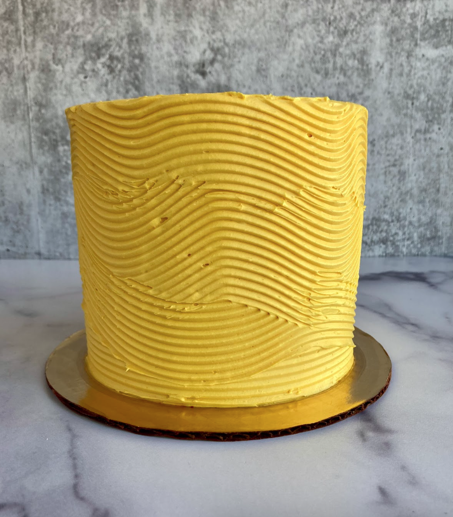  a custom cake with “textured” buttercream design 