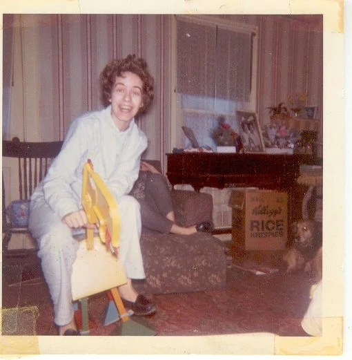 Mom on a toy horse