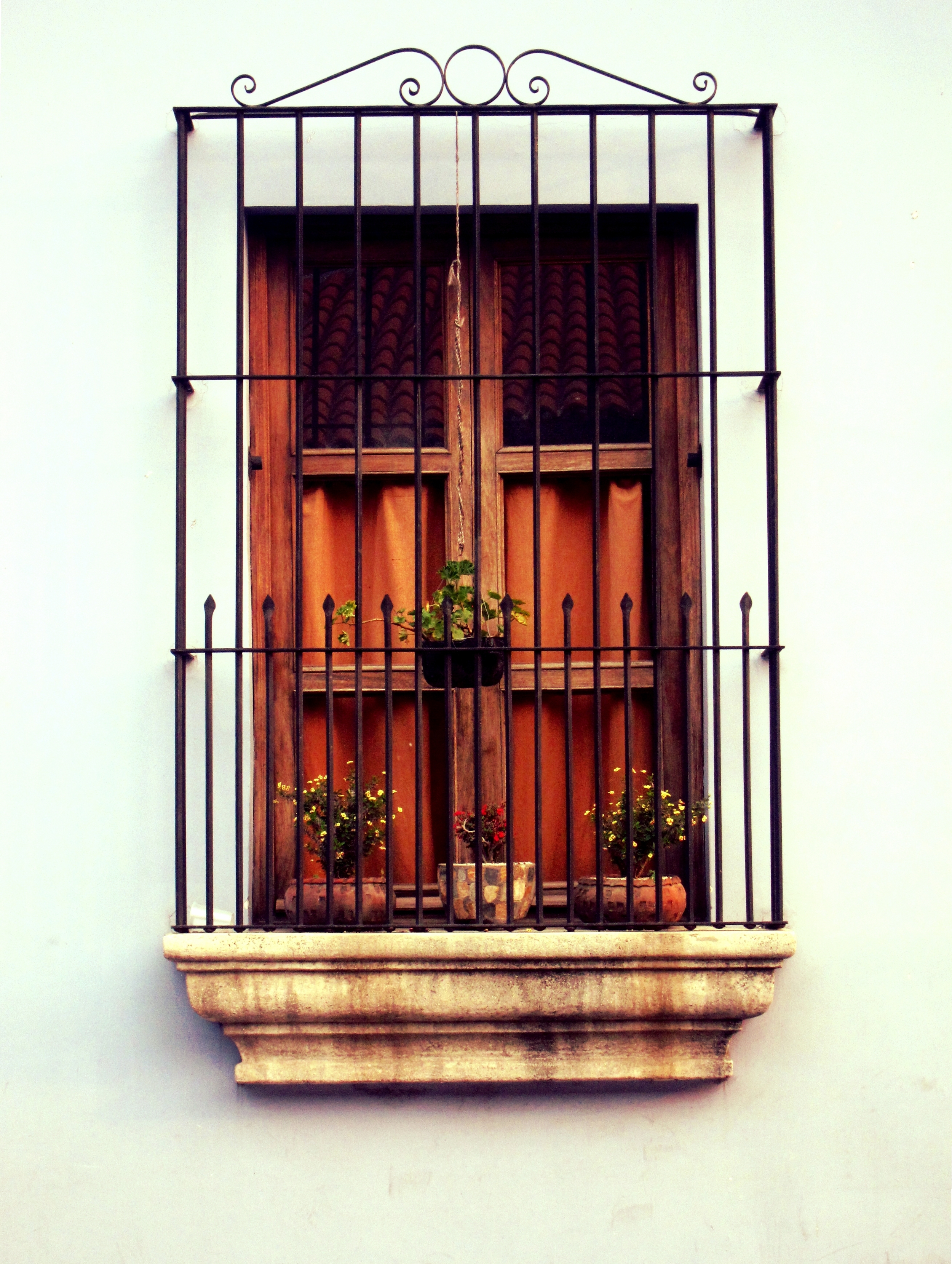 A way better image. Clear subject, near-symmetry, strong lines, interesting shapes, contrasting colors, and nice light.