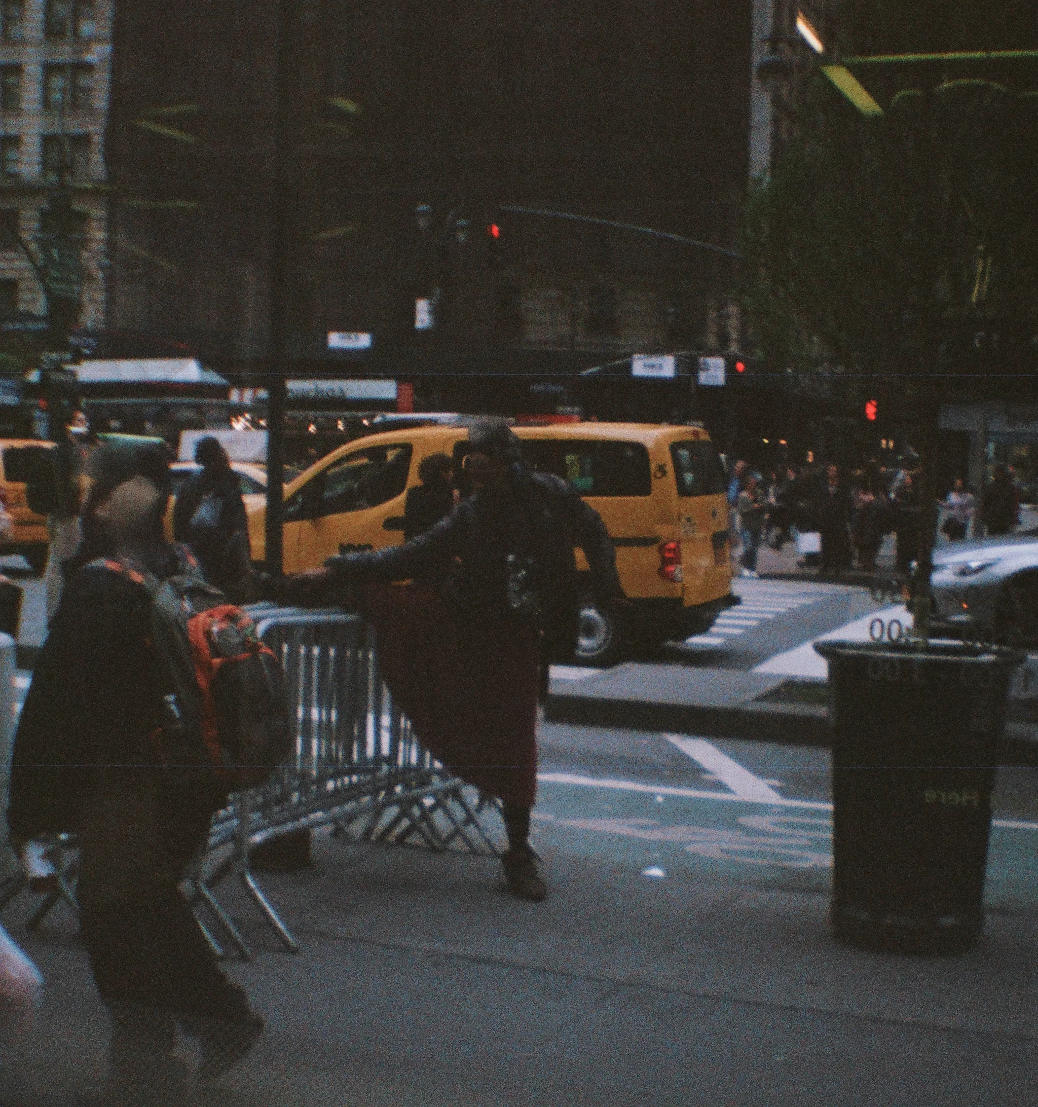 Stretching, NYC. 35mm. Diana Mini. Fujifilm Superia 400.