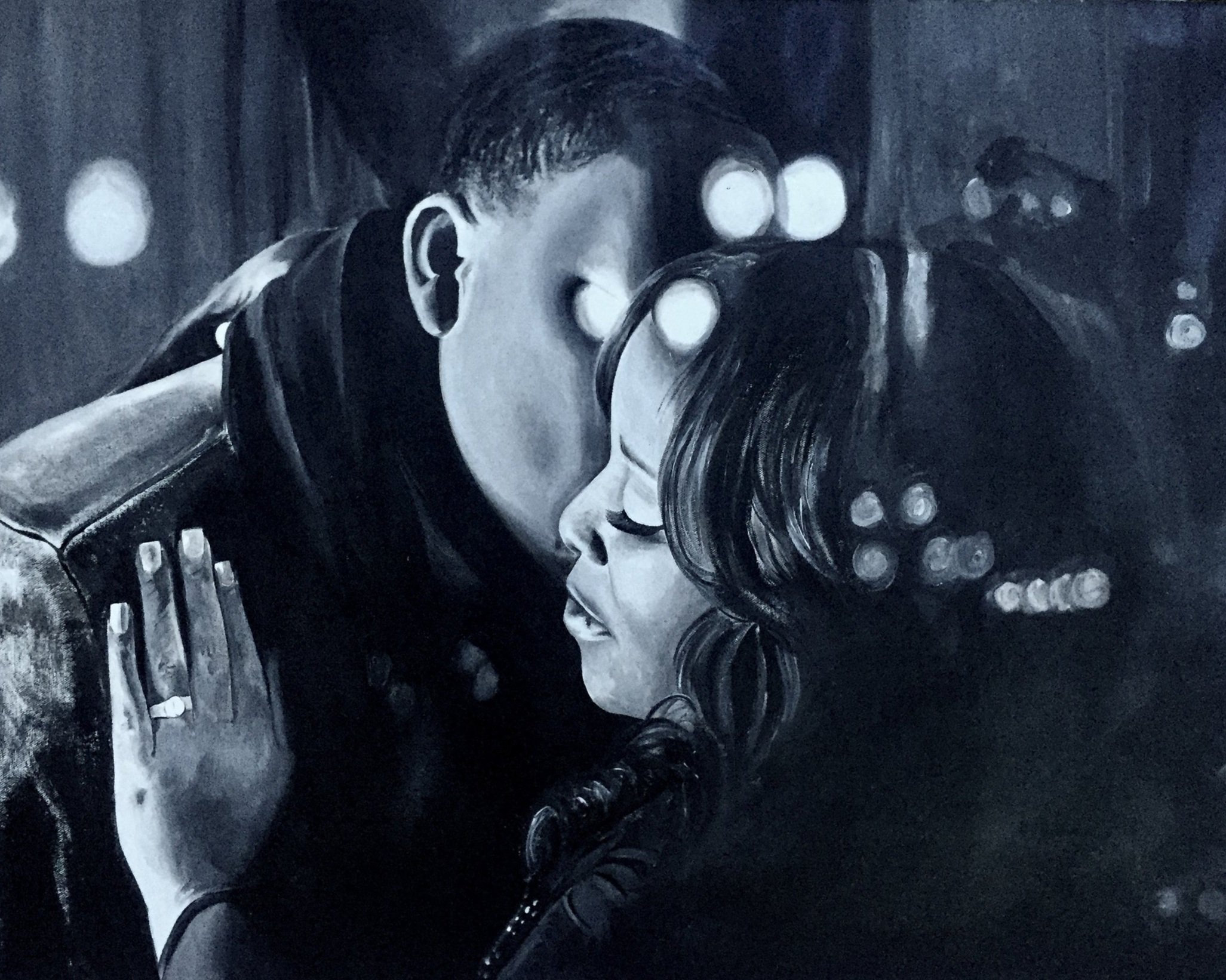 Romantic black and white portrait of a couple embracing