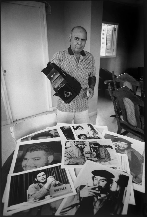 Perfecto Romero with his Photographs of Che and Fidel. Cuba. Photo : Keith Cardwell