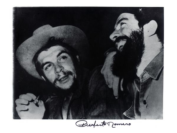 Why are they laughing? They have exchanged Hats . Che in Peasants Hat and Camillo with beret with star given by Fidel Castro.