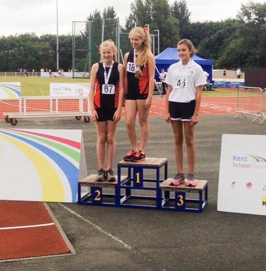 Sydnee and Kirsty-Anne receiving gold and silver medals for the year 7 girls Shot Putt.
