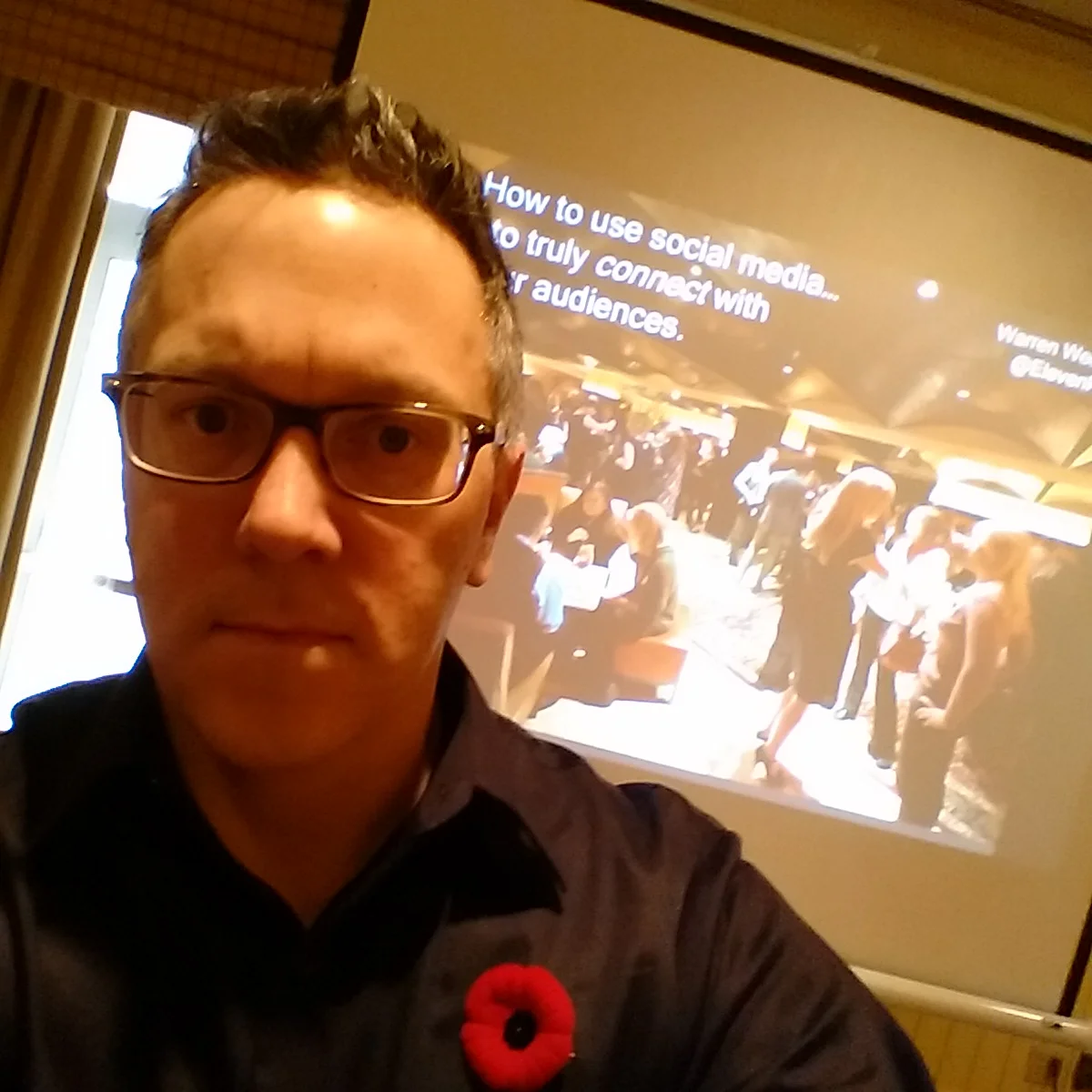 warren weeks giving a talk on how to use social media to connect with audiences at an industry conference in muskoka in november (did the poppy give it away?), 2014.