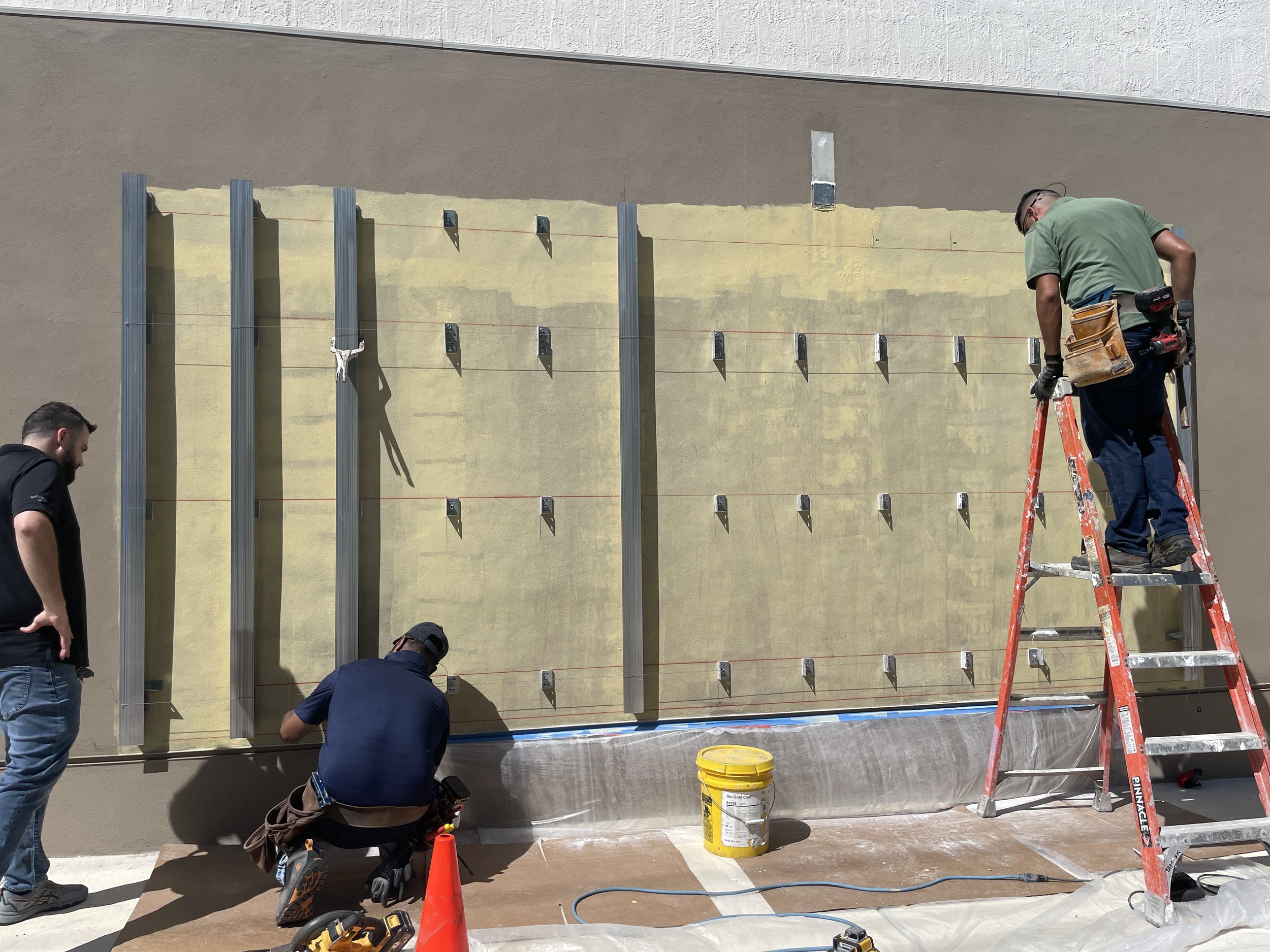 Building the structure that will hold The Journey, a mural by Nereida García-Ferraz