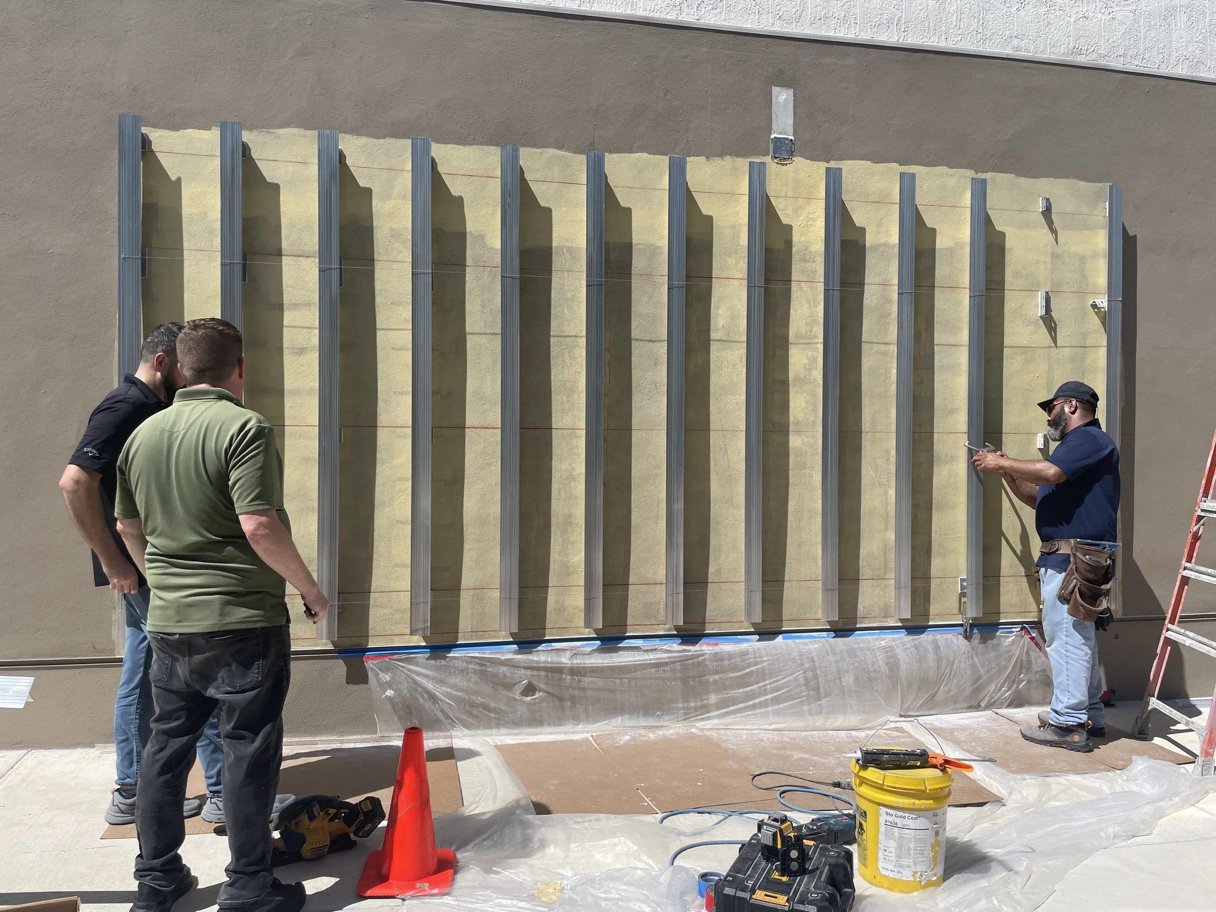 Building the structure that will hold The Journey, a mural by Nereida García-Ferraz