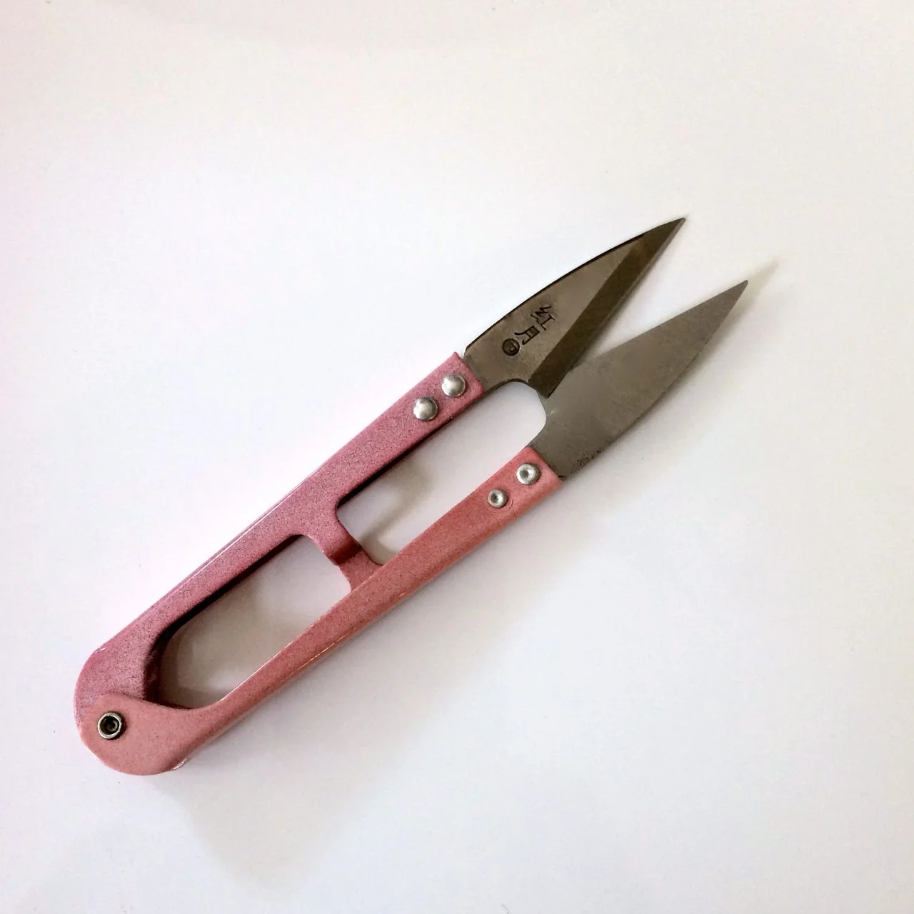 Thread snips, very low tech but useful.