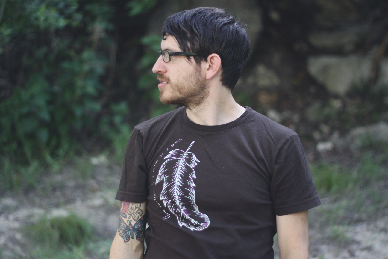james in skyline fever feather shirt.png