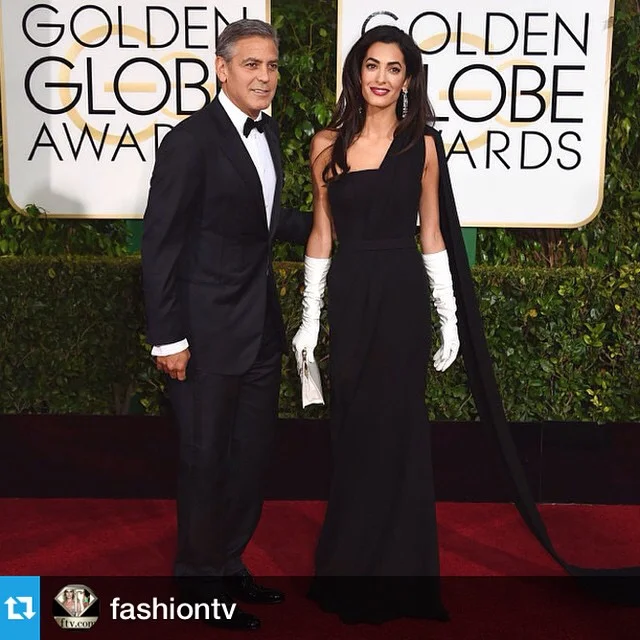 The most stylish couple!!👠 ・・・ #AmalClooney makes her #GoldenGlobes2015 Debut with #GeorgeClooney!