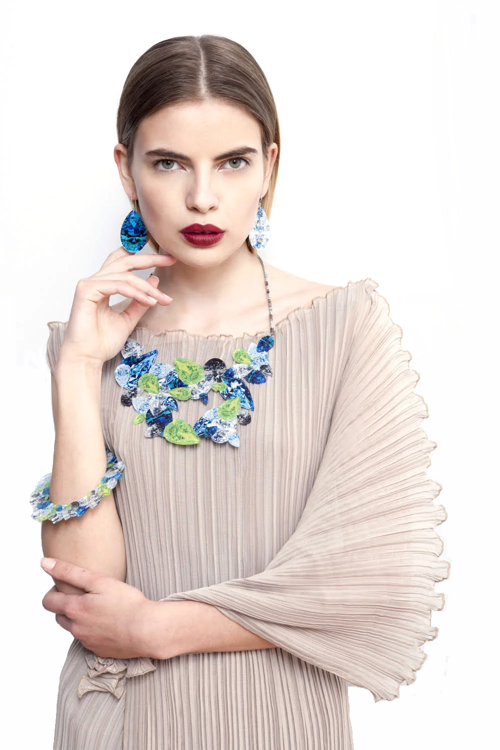 Cascading pleated dress & Trompe l'oeil jewelry.jpg