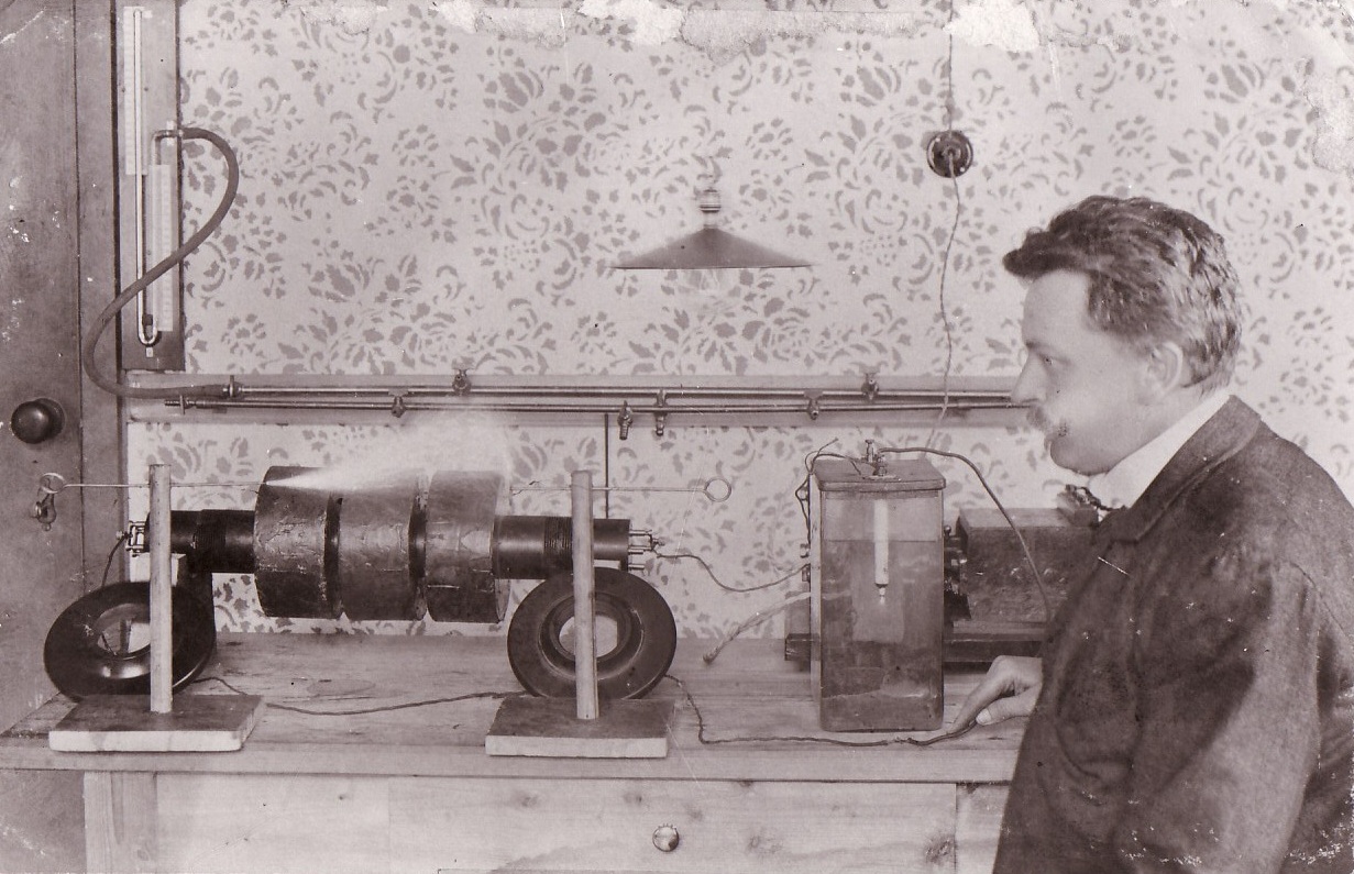 Daniel Swarovski with his crystal cutting machine circa 1900 .jpg