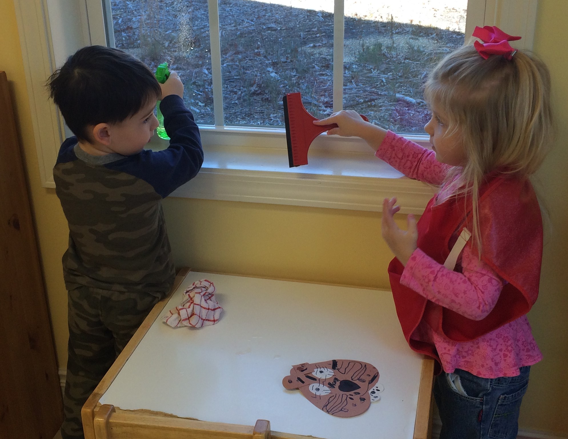 Window washing, whether with a friend or alone, gives the child the chance to beautify the environment. Often the discovery of a bird or squirrel is spotted in the process.