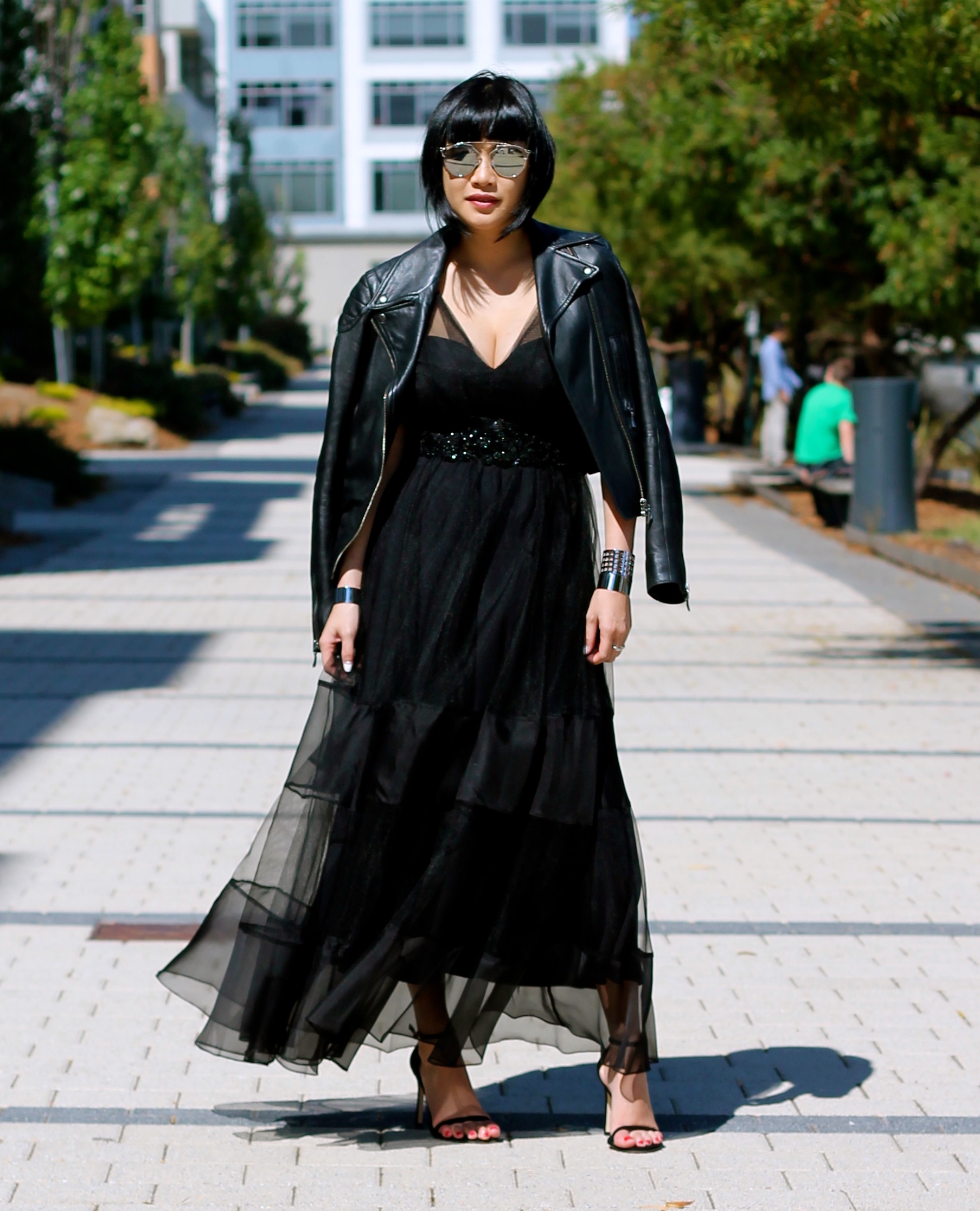 dress c/o Marchesa, Club Monaco leather jacket, Stuart Weitzman heels, Dior sunglasses, Svelte metals jewelry