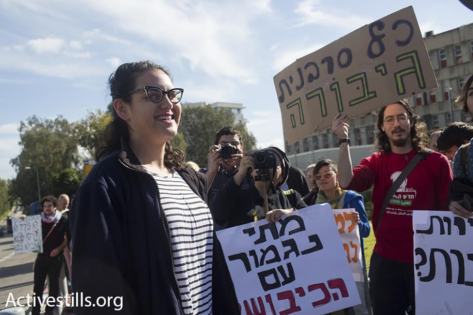 Conscientious objector Tair Kaminer is greeted by supporters outside the Tel Hashomer induction base, Ramat Gan, Israel, January 10, 2016. (photo: Oren Ziv/Activestills.org)