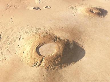 Arsia Mons et Pavonis Mons, les volcans du système occidental de Tharsis, où sera installé le premier ascenseur spatial martien.