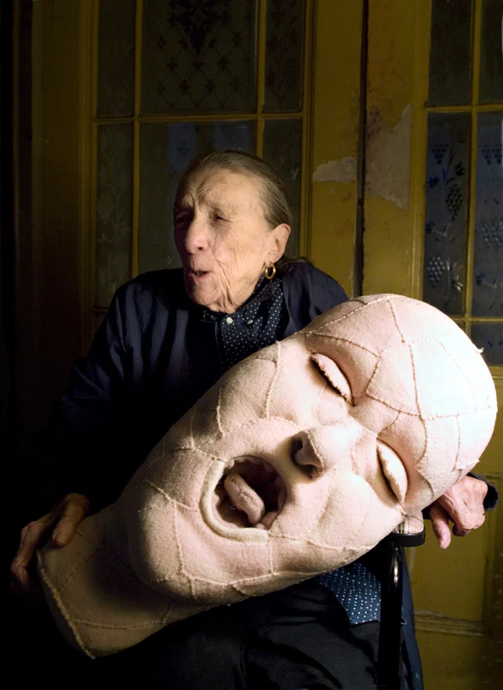 Louise Bourgeois with a fabric sculpture in progress in 2009. Photo: © Alex Van Gelder