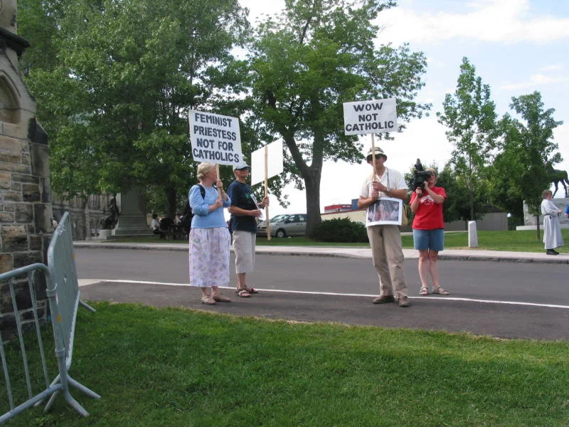 A handful of protestors make an appearance at the opening ceremony of Women's Ordination Worldwide Second International Conference in Ottawa, July 22 - 24, 2005. 