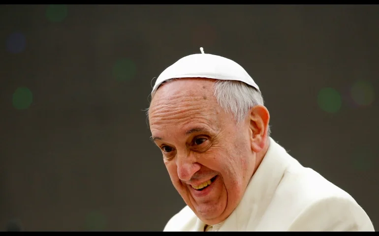 Pope Francis smiles after leading his general audience in St. Peter's Square at the Vatican Feb. 26. (CNS/Reuters/Tony Gentile)