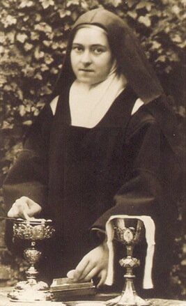 Thérèse of Lisieux preparing ciborium for mass