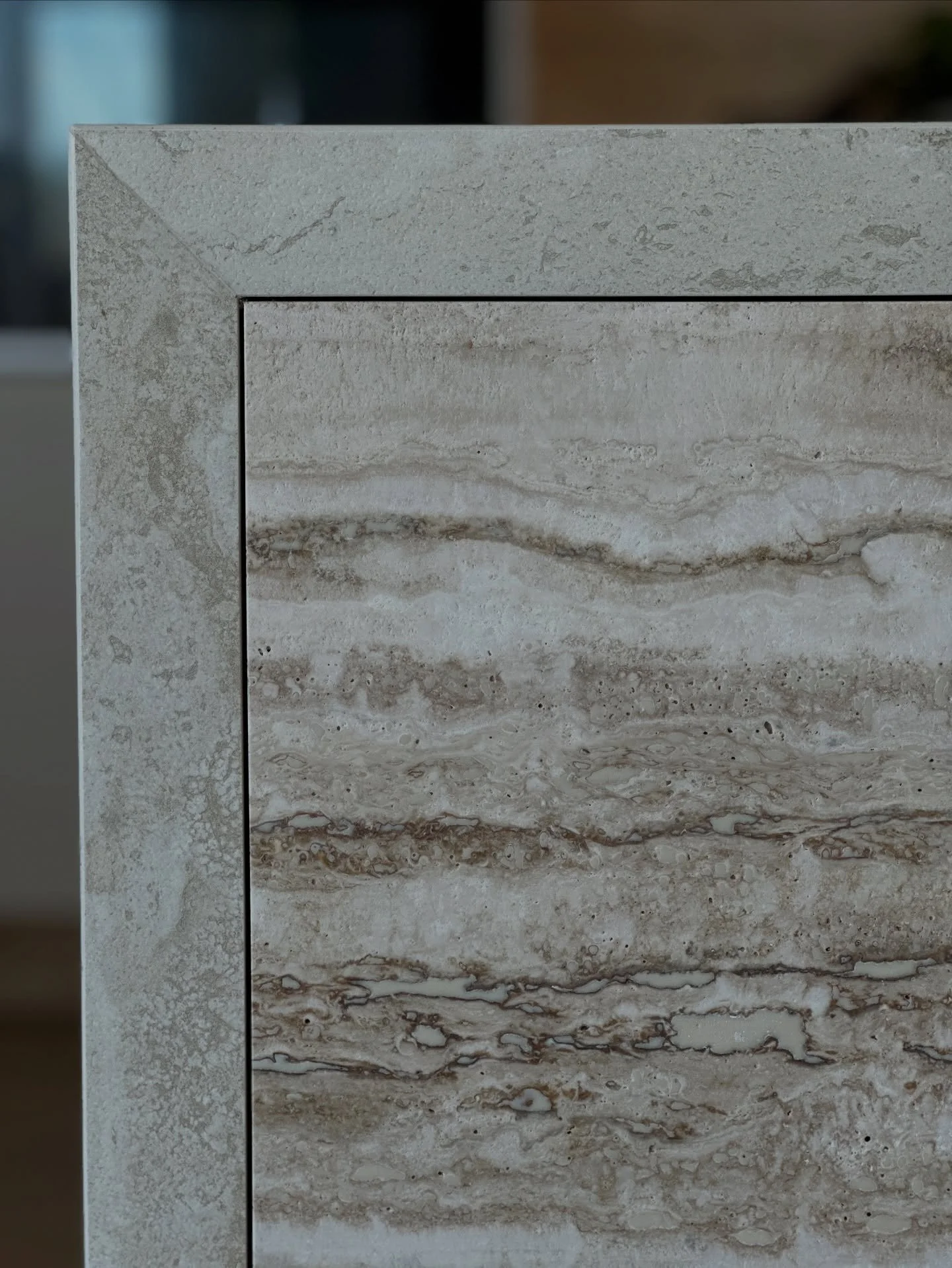 Materiality is everything in interior design! This kitchen island from our clients&rsquo; recent install marries a mitred porcelain waterfall benchtop (perfect for putting hot things directly onto) with a stunning natural travertine stone below.