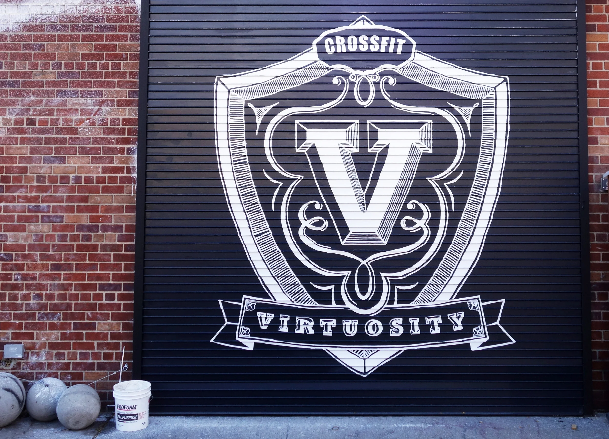 Rollgate sign at CrossFit Virtuosity in Williamsburg, Brooklyn, NY.