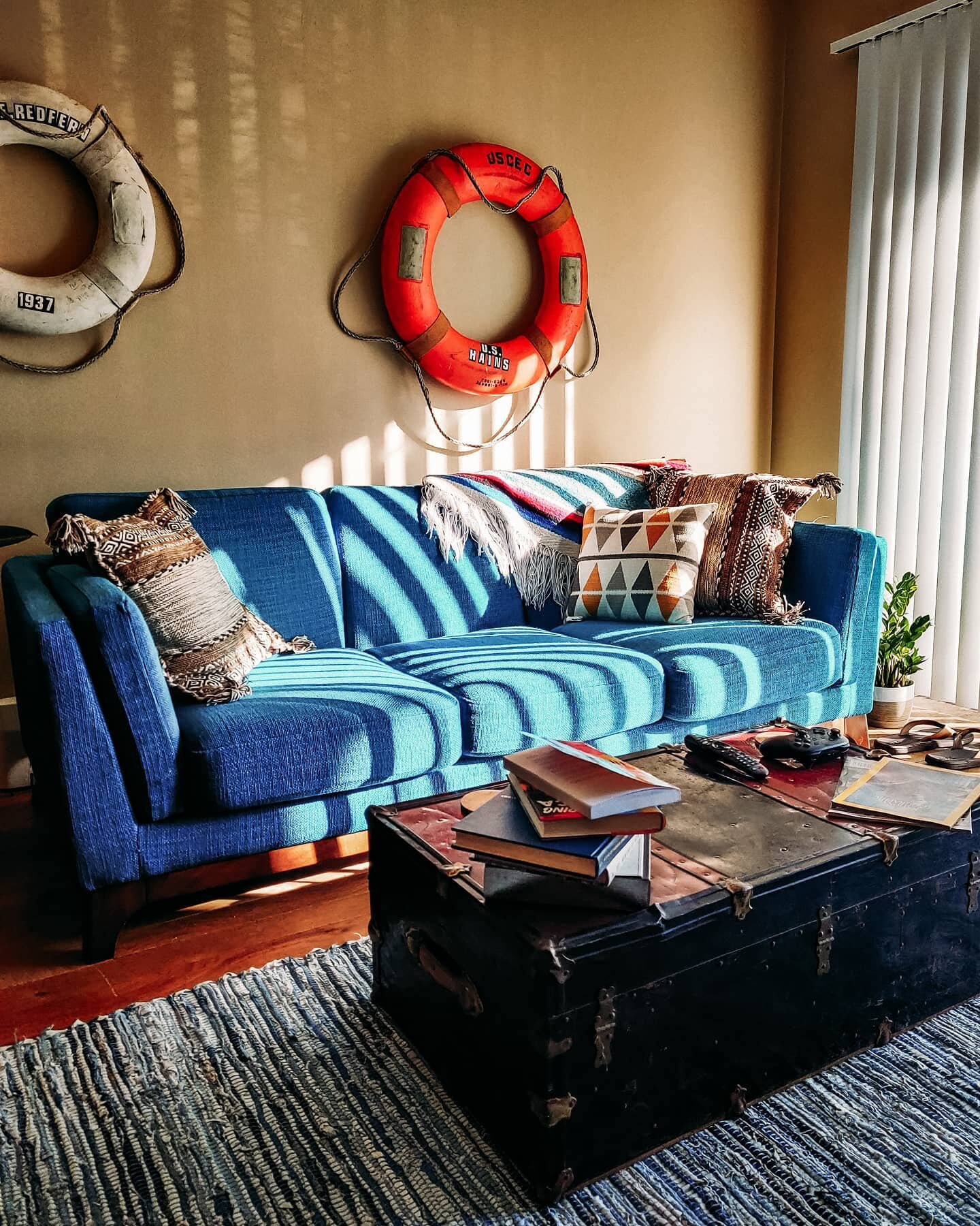 I spent to long watching the light through the blinds trace down the life rings, so this is where I caught it.
Quiet mornings with the sun out, coffee at my side, watching the light flow over life rings from my grandpa's old ship post...it's those si