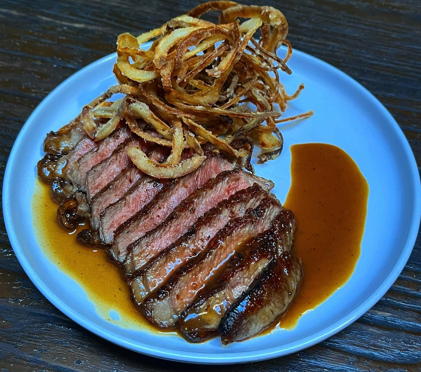 AAA = Appetite Appeal Achieved

Magnificent plating of this pan-fried @OConnorBeef striploin, roasted garlic butter &amp; pan juices, crispy onions

Thank you for sharing @chef.rick.welch and @andaluzbar